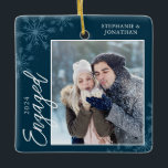 Elegant Engaged Christmas Snowflakes Blue Ceramic Ornament<br><div class="desc">This dark blue square Christmas ornament is a perfect gift for the newly engage couple. The design features a photo frame with handwritten text "Engaged" and is accented with light blue snowflakes on a dark blue background. Personalize with a pictures of the couple,  their names and year.</div>
