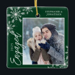 Elegant Engaged Christmas Snowflakes Green Ceramic Ornament<br><div class="desc">This square Christmas ornament is a perfect gift for the newly engage couple. The design features a photo frame with handwritten text "Engaged" and is accented with light grey snowflakes on a dark green background. Personalise with a pictures of the couple,  their names and year.</div>
