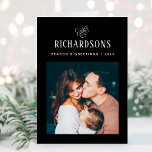 Elegant Family Photo and Name | Season's Greetings Holiday Card<br><div class="desc">This simple and minimalist, elegant dark black and white folded holiday card features your personal photo on the front, and an additional photo on the inside, for a total of two of your favourite family photos. Classic calligraphy along with modern text for your family name add a stylish touch and...</div>