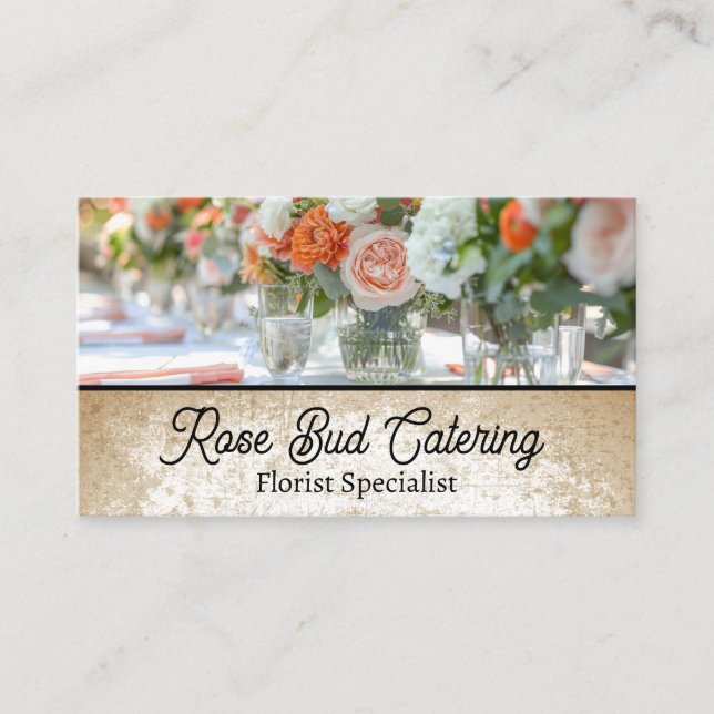 Elegant Floral Centerpiece on White Table Cloth Business Card (Front)