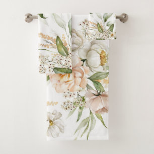 Elegant floral towels with soft, pastel flowers 
