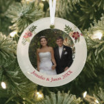 Elegant Floral Wedding Photo Keepsake Christmas Glass Tree Decoration<br><div class="desc">This beautiful custom wedding photograph ornament features a pretty photo of the happy couple and personalised text underneath. Add your own ceremony or first kiss photo for a classy keepsake present you will enjoy every holiday season. Decorated with chic floral sprays on either side of the picture, these elegant Christmas...</div>
