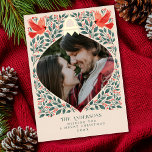 Elegant Folk Art Cardinal Christmas Foliage Photo  Foil Holiday Card<br><div class="desc">Send holiday cheer with this stunning Christmas card featuring real gold foil! Showcase your photo in an ornament-shaped frame, surrounded by festive leaves, berries, and charming red cardinals. It's a lovely way to share love and joy this season. The placeholder image is provided by Unsplash and is NOT for sale;...</div>