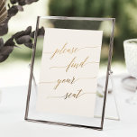 Elegant Gold and Ivory Please Find Your Seat Sign<br><div class="desc">This elegant gold and ivory please find your seat sign is perfect for a simple wedding. The neutral design features a minimalist sign decorated with romantic and whimsical faux gold foil typography. This sign can be used for a wedding or any event or party. Please Note: This design does not...</div>