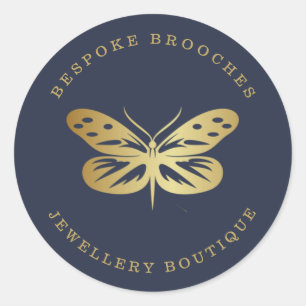 Elegant gold butterfly on dark blue classic round sticker