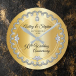 Elegant Gold Diamonds 50th Wedding Anniversary Round Clock<br><div class="desc">Opulent elegance frames this wedding anniversary design in a unique scalloped diamond design with center teardrop diamond with faux added sparkles on a gold-tone gradient. Please note that all embellishments are printed and are only made to appear as real as possible in a flat, printed design. This includes any metallic...</div>