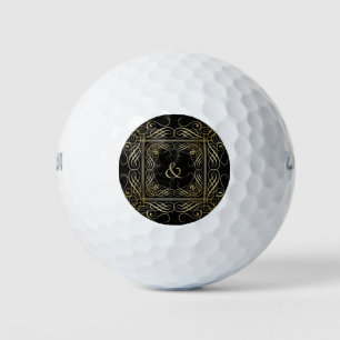 Elegant Gold Foil Look Scrollwork Script on Black Golf Balls