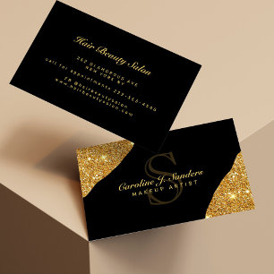 Elegant gold glitter black monogram makeup artist business card