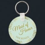 Elegant Gold Lace on Mint Maid of Honour Wedding Key Ring<br><div class="desc">This beautiful key chain is designed as a wedding gift or favour for the Maid of Honour. It features an elegant pale neo mint green coloured design with a gold faux foil flourish border and the text "Maid of Honour" as well as a place to enter her name, the couple's...</div>