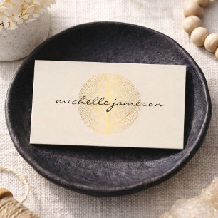 Elegant Gold Leaf Logo on Light Tan Business Card