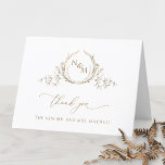 Elegant Gold Monogram Wedding Thank You Card<br><div class="desc">Thank your guests with an elegant custom wedding thank you card! Design with a beautiful gold faux foil hand-drawn botanical monogram with the couple's initials, elegant thank you phrase, and text section to personalise it as you wish. Option to add a photograph on the inside top section, or skip it...</div>