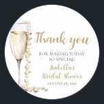 Elegant Gold Pearls and Prosecco Bridal Shower Classic Round Sticker<br><div class="desc">The Elegant Gold Pearls and Prosecco Bridal Shower Sticker is a sophisticated and stylish addition to any bridal shower celebration. With its elegant design featuring gold pearls and prosecco champagne, this sticker adds a touch of luxury and refinement to favours, envelopes, or decor. Whether used to seal envelopes, adorn gift...</div>