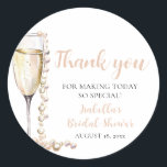 Elegant Gold Pearls and Prosecco Bridal Shower Classic Round Sticker<br><div class="desc">The Elegant Gold Pearls and Prosecco Bridal Shower Sticker is a sophisticated and stylish addition to any bridal shower celebration. With its elegant design featuring gold pearls and prosecco champagne, this sticker adds a touch of luxury and refinement to favours, envelopes, or decor. Whether used to seal envelopes, adorn gift...</div>
