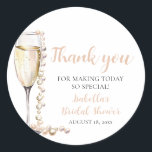 Elegant Gold Pearls and Prosecco Bridal Shower Classic Round Sticker<br><div class="desc">The Elegant Gold Pearls and Prosecco Bridal Shower Sticker is a sophisticated and stylish addition to any bridal shower celebration. With its elegant design featuring gold pearls and prosecco champagne, this sticker adds a touch of luxury and refinement to favours, envelopes, or decor. Whether used to seal envelopes, adorn gift...</div>