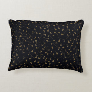 Elegant Gold Swirling Vine Pattern on Black Decorative Cushion