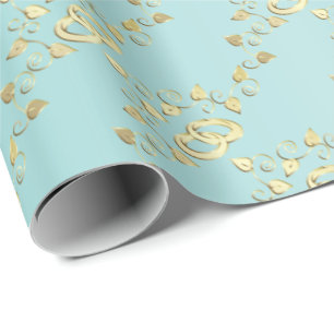 Elegant Gold Wedding Rings on  Light Blue Wrapping Paper