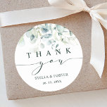 Elegant Green Foliage Thank You Classic Round Sticker<br><div class="desc">This thank you sticker features painted watercolor eucalyptus,  botanical green,  and light blue leaves with modern calligraphy.</div>