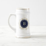 Elegant Groomsmen Beer Stein<br><div class="desc">Elevate your groomsman's experience with our vintage-inspired gold and navy blue monogrammed beer stein. This modern twist on a classic design exudes elegance,  featuring a monogram with their initial and name. The perfect personalised gift to commemorate your special day.</div>