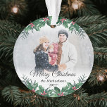 Elegant Holly Greenery 2 Photo Merry Christmas Ornament<br><div class="desc">Celebrate the simple joys of the holidays with a custom Merry Christmas two photo round acrylic ornament. The pictures and all wording on this template are easy to personalise and can be different or the same on front and back. The script can be changed to First Christmas, Seasons Greetings, a...</div>