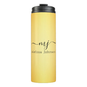 Elegant initials on gold thermal tumbler