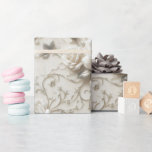 Elegant Ivory Rose with Silver Floral design Wrapping Paper<br><div class="desc">Wrap your gifts in timeless elegance with this luxurious ivory rose wrapping paper. Featuring delicately embossed-style roses with soft silver accents and swirling floral vines, this design exudes sophistication and romance. Perfect for weddings, anniversaries, bridal showers, or any occasion where you want your gift to feel as special as the...</div>