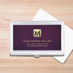Elegant Leather Luxury Gold Monogram Business Card Holder<br><div class="desc">Simple modern luxury design with brushed metallic gold initial logo medallion with personalised name,  title,  company name or custom text below in classic block typography on a purple leather textured background. Personalise for your custom use.</div>