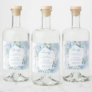 Elegant light pastel blue flowers and eucalyptus liquor bottle label