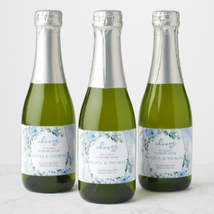 Elegant light pastel blue flowers and eucalyptus sparkling wine label