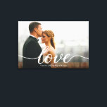Elegant Love Script Wedding Photo Custom Canvas Print<br><div class="desc">Celebrate your special day with this Elegant Love Script Wedding Photo Keepsake Custom Canvas Print. Featuring your favourite wedding photo, this design incorporates a romantic script "Love" motif paired with your names and wedding date for a timeless, personal touch. Perfect as a keepsake for newlyweds, an anniversary gift, or a...</div>