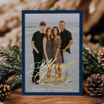 Elegant Merry Christmas Script Navy 2 Photo Foil Holiday Card<br><div class="desc">Introducing the Elegant Merry Christmas Navy and Gold Foil Script holiday photo card, a beautifully simple and modern way to send holiday cheer. Featuring your vertical photo framed in navy, the card displays "Merry Christmas" in elegant gold foil calligraphy overlaying the image. Customise with your name and the year in...</div>
