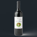Elegant Merry Christmas Wreath  Wine Label<br><div class="desc">Elegant Christmas theme wine label featuring a watercolor illustration of a holiday wreath with a red bow. The text above says "merry christmas" in script font.</div>