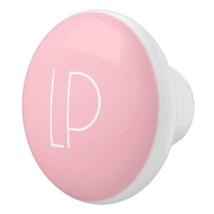 Elegant minimalist modern initial on pastel pink ceramic knob