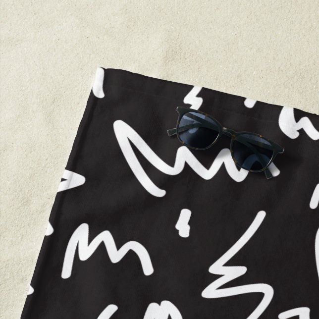Elegant modern black and white beach towel (In Situ)
