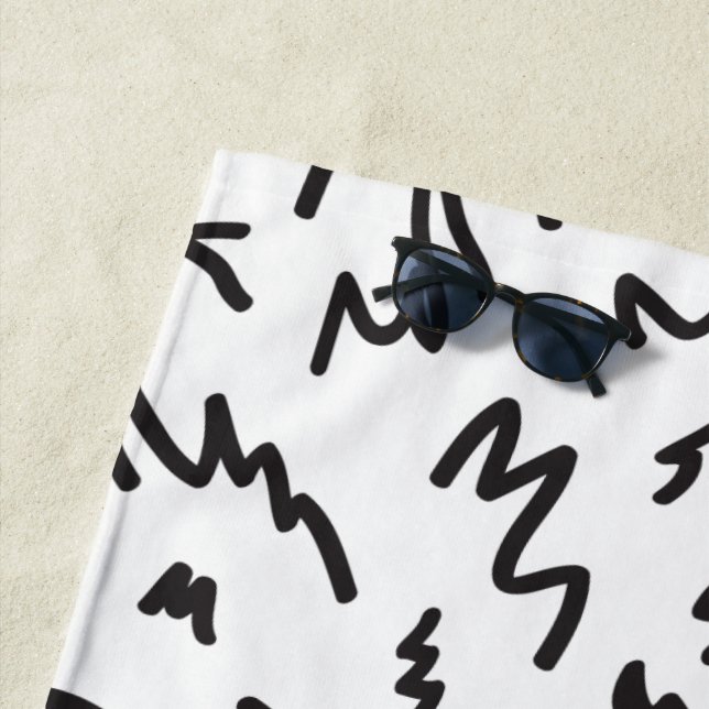 Elegant modern black and white beach towel (In Situ)
