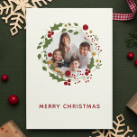 Elegant Modern Christmas Wreath Holiday Card<br><div class="desc">Send your warmest wishes this season with this elegantly festive modern holiday card featuring a rustically simple central photo bounded by a wreath of wintery greenery. Minimalist typography with customisable sentiment. Card radiates modern simplicity, warmth and joy, perfect for your holiday wishes. ❀❀❀ Fully personalizable and easily customisable. If needed,...</div>