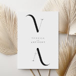 Elegant Modern Minimalist Black and White Wedding Invitation<br><div class="desc">Modern Minimalist Black and White Wedding Invitation. Features elegant monogram typography and minimal graphic design. Personalise text with all the details of your special day.</div>
