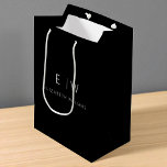 Elegant Modern Modern Minimalist Monogram Name Medium Gift Bag<br><div class="desc">Present your gifts in style with our Black and White Modern Minimalist Monogram Name Gift Bag. This elegant bag boasts a clean and contemporary design, featuring a customisable monogram that adds a personalised touch to your gift-giving. Crafted with quality in mind, this bag is both sophisticated and minimalist, making it...</div>