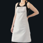 Elegant Modern Monogram Personalised With Name Apron<br><div class="desc">Elevate your culinary endeavours with our Cream Ivory Elegant Modern Monogram Personalised With Name Apron. Meticulously designed, this apron seamlessly blends contemporary aesthetics with a personalised touch, making it a stylish and practical addition to your kitchen attire. Featuring your name and a monogram, this apron adds a touch of sophistication...</div>