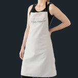 Elegant Modern Monogram Personalised With Name Apron<br><div class="desc">Elevate your culinary endeavours with our Cream Ivory Elegant Modern Monogram Personalised With Name Apron. Meticulously designed, this apron seamlessly blends contemporary aesthetics with a personalised touch, making it a stylish and practical addition to your kitchen attire. Featuring your name and a monogram, this apron adds a touch of sophistication...</div>