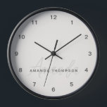 Elegant Modern Personalised With Name Monogram Clock<br><div class="desc">Elevate your home decor with our Cream Elegant Modern Personalised With Name Monogram Clock. This finely crafted wall clock seamlessly blends contemporary aesthetics with a personalised touch, making it a stylish and functional addition to any room. Featuring your name and a monogram, this clock adds a touch of sophistication and...</div>