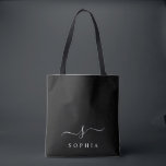 Elegant Monogram Black White Modern Minimalist  Tote Bag<br><div class="desc">Personalise this stylish tote bag with your name initial monogram. Design features a simple custom monogram design in classic white modern minimalist typography on a black background. Easy to customise. Perfect as a gift item for all your loved ones. Grab one for yourself as well.</div>