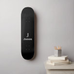 Elegant Monogram Initial Name Personalised Black Skateboard<br><div class="desc">Modern simple masculine stylish with black and white trendy typography (changeable colours). Personalised gift for him: dad,  father,  husband,  son,  boyfriend,  groom,  best man,  groomsmen</div>