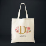 Elegant Monogram Name Initial Gold Pink Tote Bag<br><div class="desc">A beautiful,  feminine monogrammed pink floral tote bag featuring pink flowers and a faux gold monogram letter "D". Personalise the tote bag by adding your name underneath the monogram. Makes a fun gift for a friend or for a bridesmaid gift. Designed for you by Blackberry Boulevard.</div>
