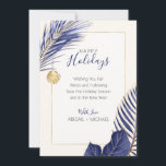 Elegant Navy Blue & Gold Beach Tropical Christmas Holiday Card<br><div class="desc">Nautical Boutique Co.'s elegant navy blue and gold holiday card features watercolor blue and gold tropical greenery and is accented with a pretty watercolor seashell. The text is whimsical hand-lettering paired with modern block typography. The green, gold, and creamy ivory are reminiscent of tropical holidays at the beach. Easily customise...</div>