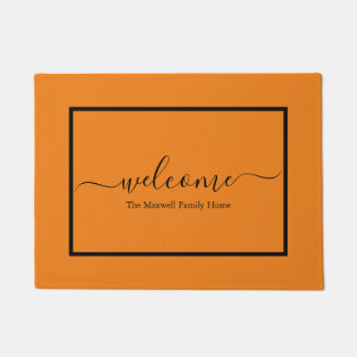 Elegant orange black script family name welcome  doormat