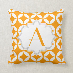 Elegant orange, white geometric pattern cushion