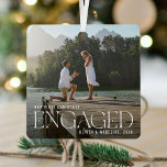 Elegant Our 1st Christmas Engaged Photo Keepsake Metal Tree Decoration<br><div class="desc">Beautiful minimal and modern couple's photo engagement christmas ornament. Simple and modern design with a full photo template. Customise this gift with your special engagement photo, year, and name/s. The photo has an overlay at the bottom to help the elegant white typography "Engaged" stand out. Perfect keepsake ornament for couples...</div>