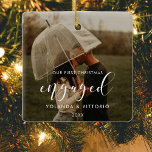Elegant Our First Christmas engaged couple photo Ceramic Ornament<br><div class="desc">A modern typography for this photo ornaments collection for newly engaged couples. To customize with your favorite picture. You can also easily change the color of the font to your liking.</div>
