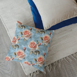 Elegant Peach Roses on Blue Background Cushion