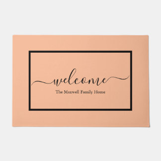 Elegant peach script family name welcome doormat